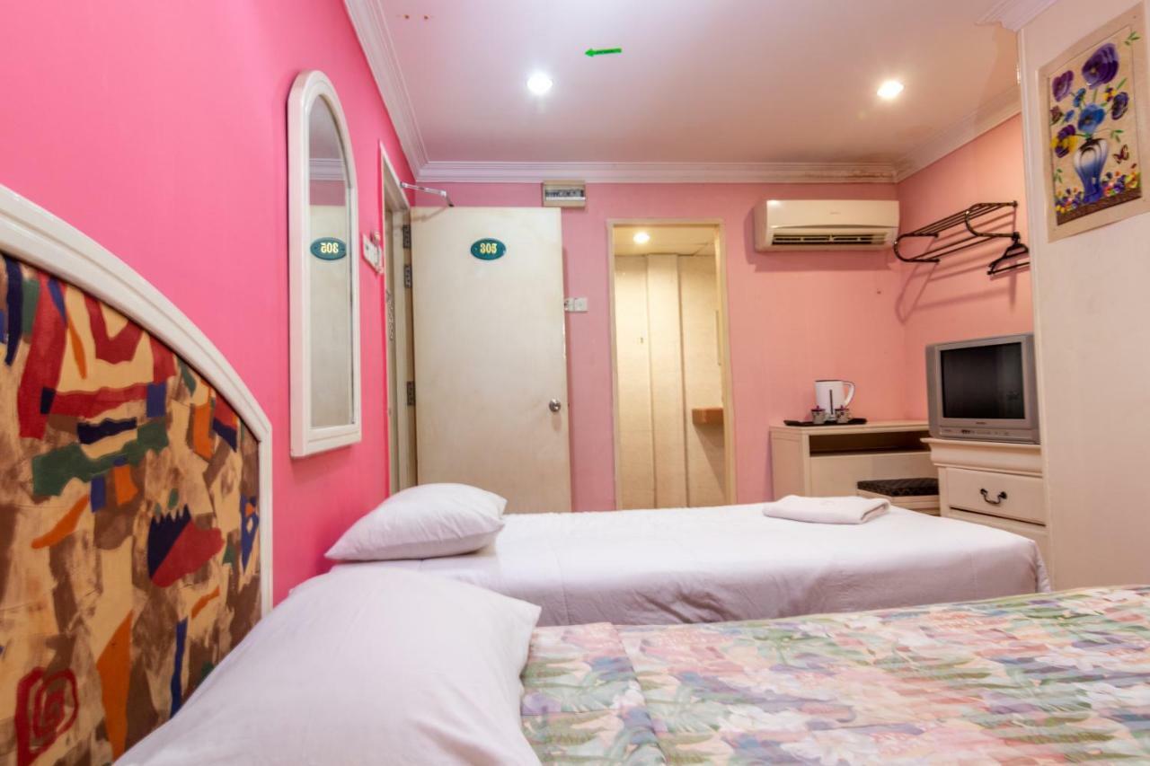 Hotel Grande Malacca Quarto foto