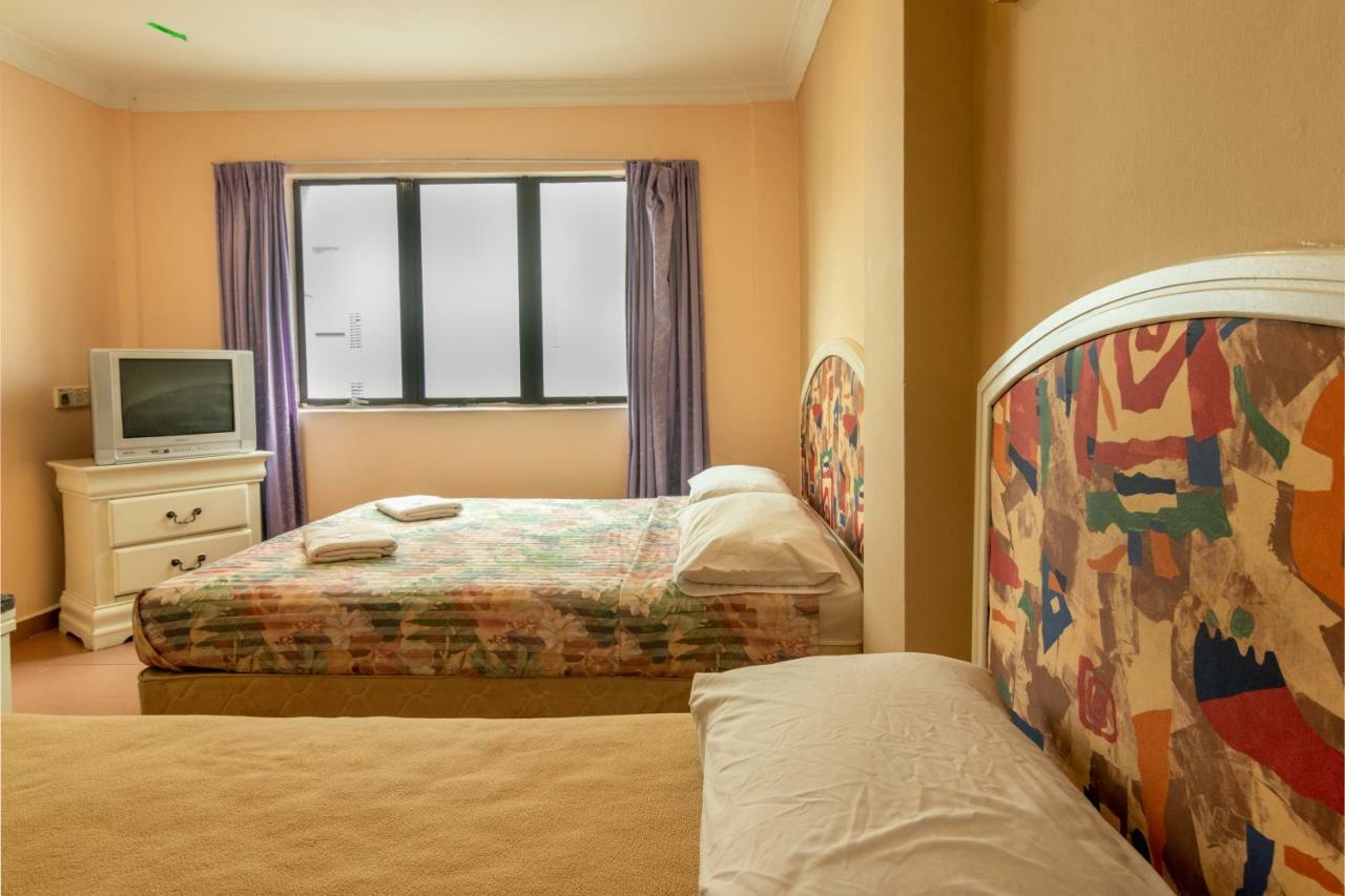 Hotel Grande Malacca Quarto foto